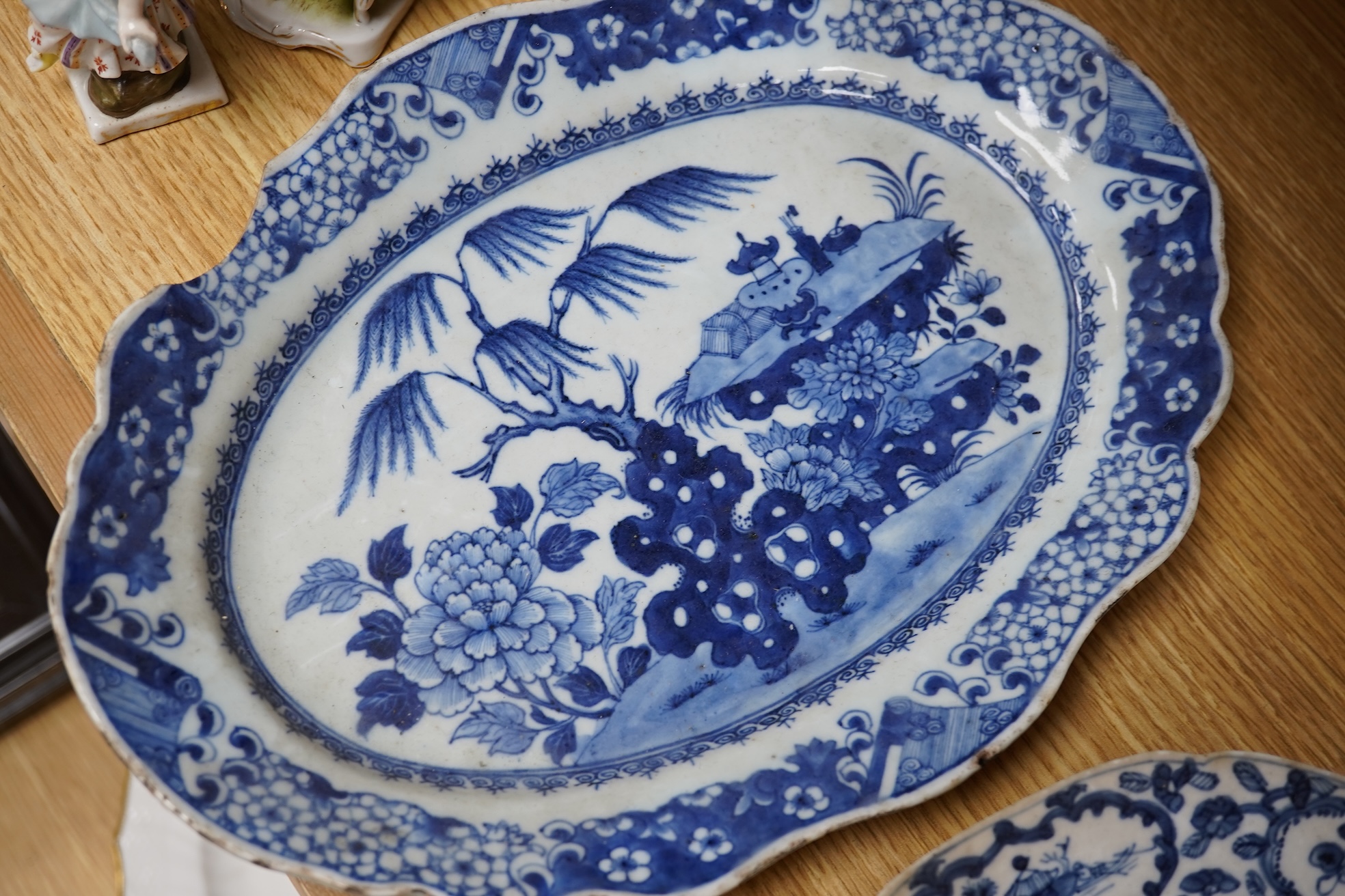 Two 18th century Chinese blue and white dishes, largest 31cm